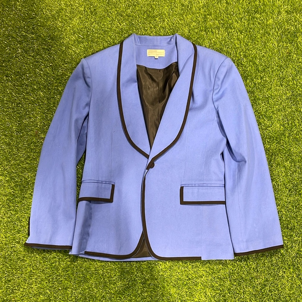 Blue 80s style blazer with black trim and button detail on sleeves.